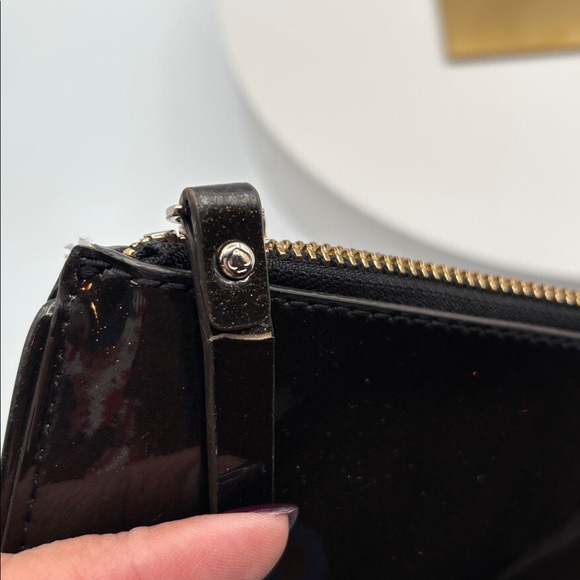Pre-loved Kate Spade Patent Leather Bow Clutch.